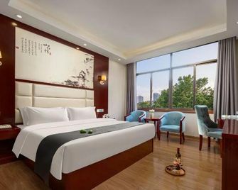 Wansheng Business Hotel - Changsha - Bedroom