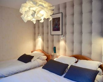 Hôtel et appartements les platanes - Thueyts - Chambre