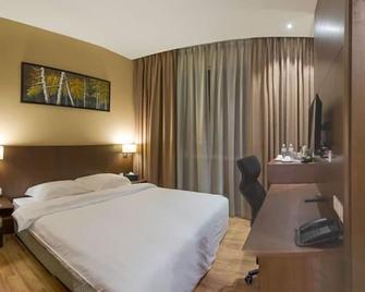 Keoja Hotel - Kuala Belait - Camera da letto
