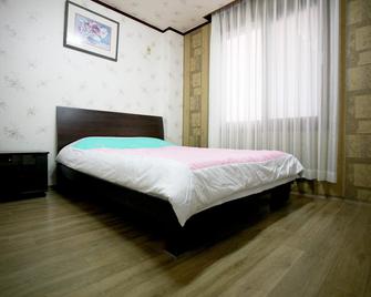 Jeju Songwon Motel - Seogwipo - Habitación
