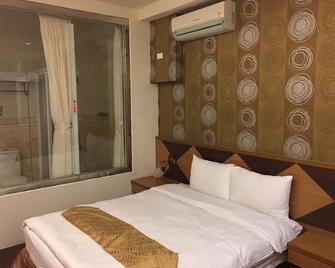 RI Yue HU Pan Hotel - Nantou City - Bedroom