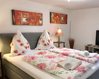 Ferienwohnung Luna - Charmant und zentral im renovierten Insel-Altstadthaus - Lindau - Schlafzimmer