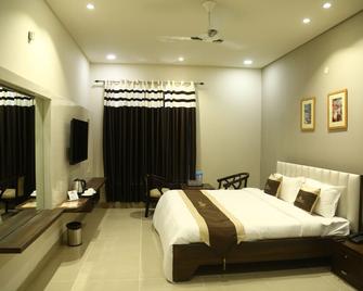 Hotel Bhumi Residency Panipat - Pānīpat - Bedroom