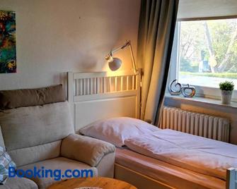 Ferienwohnungen und Ferienhaus im Nixenweg - Hohwacht - Bedroom