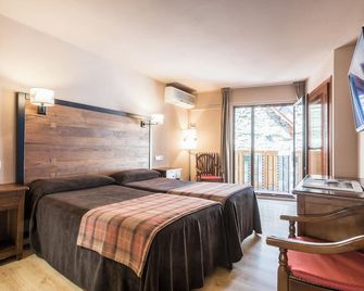 أوتل ريو نيري - Viella - غرفة نوم