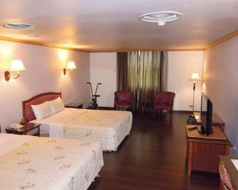 San Ho Business Hotel - Huwei Township - Bedroom