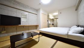 Hotel Resort Inn Ishigakijima - Ishigaki - Phòng ngủ