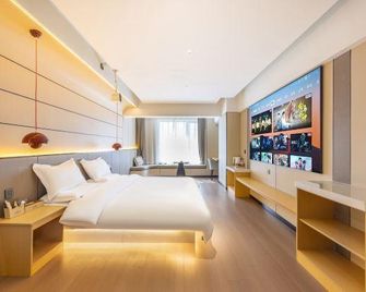 Lanzhou Yiju Smart Hotel Apartment - Lanzhou - Bedroom