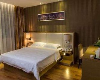 Super 8 by Wyndham Guangzhou Huanshi Xicun Subway Station - Cantón - Habitación