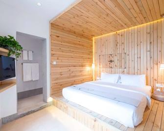 Zen Tea House Elephant Trunk Hill Park - Guilin - Schlafzimmer