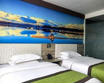 Ge Ri Hotel - Hainan - Habitación