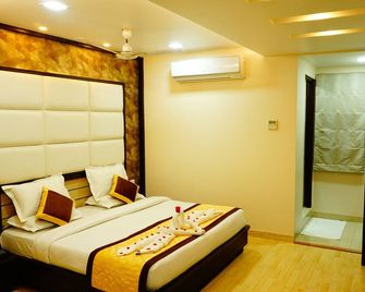 Hotel Golden Laurel Inn - Deoria - Bedroom