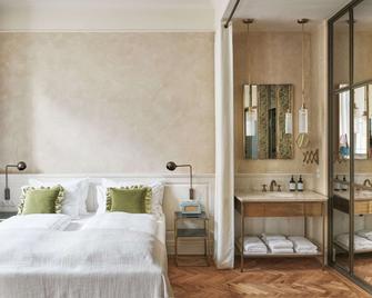 Hotel MOTTO - Wina - Kamar Tidur