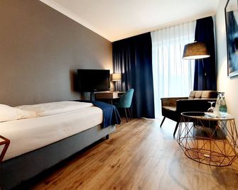 Hotel Räucherhansl - Loiching - Bedroom