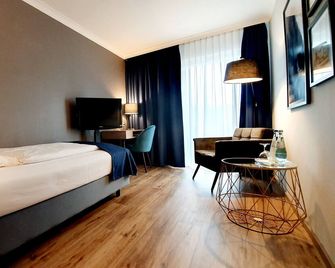 Hotel Räucherhansl - Loiching - Schlafzimmer
