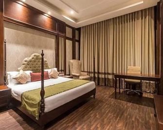 Calista Resort - ניו דלהי - חדר שינה