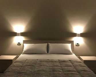 Cà Risorta Stanze - Sona - Camera da letto
