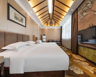 Borrman Hotel Chengdu Tianfu Square Metro Station - Chengdu - Bedroom