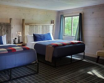 Vintage Block Inn & Suites - Okoboji - Bedroom