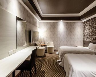 All Fun Business Hotel - Taichung City - Bedroom