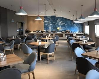 Home Inn Neo Qingdao Taidong Pedestrian Street Taidong Metro Station - Qingdao - Restaurant