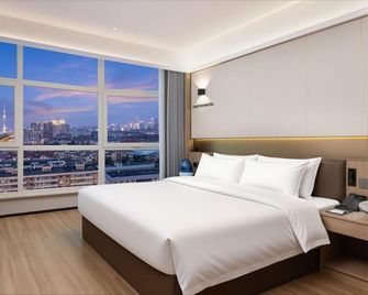 Century Hotel - Tianjin - Schlafzimmer