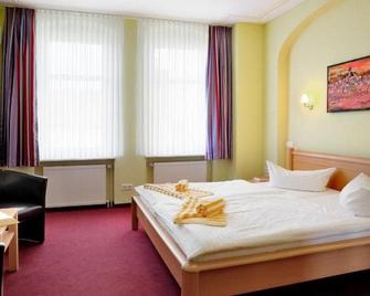 Hotel-Pension Am Schwanenteich - Lutherstadt Wittenberg - Slaapkamer
