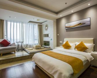 Boyue Yilin Hotel (South High-speed Railway Station) - Zhenjiang - Slaapkamer