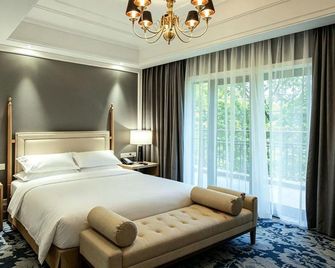 Pengxin Garden Guobin Hotel - Nantong - Bedroom