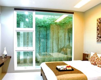 أمبيرا آفينو ريزيدانس - جاكرتا - غرفة نوم