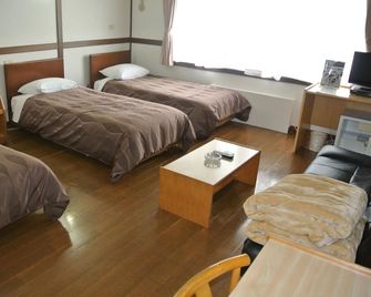 Hotel Biwako Plaza - Moriyama - Schlafzimmer