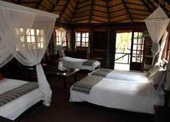 The Tree Lodge at Sikumi - Dahlia - Bedroom