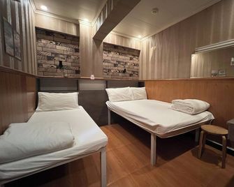 Kowloon Hostel - Hong Kong - חדר שינה