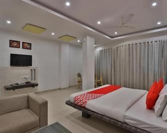 Hotel Harmony - Vadodara - Phòng ngủ