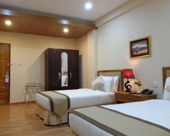 Royal Khattar Hotel - Yangon - Κρεβατοκάμαρα