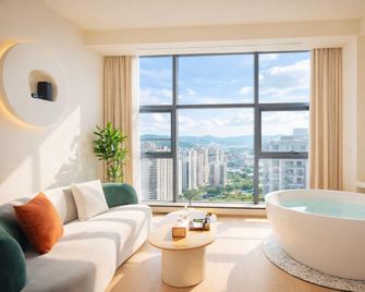 Yuansu Loft Aesthetic Homestay (Tongren Jiuyicheng Branch) - Tongren - Bedroom
