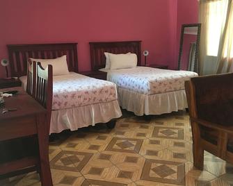 Gomwe Guest Inn - Nata - Habitación