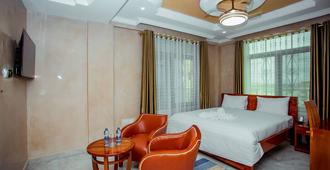 Silver Paradise Hotel - Daressalam - Schlafzimmer