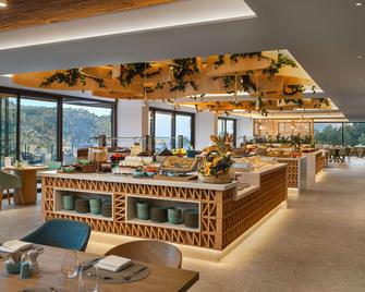 Cala San Miguel Hotel Ibiza, Curio Collection by Hilton - Sant Joan de Labritja - Restaurant