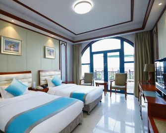 Beidaihe Bei Hua Yuan Sea View Hotel (Beidaihe Biluo Tower) - Qinhuangdao - Bedroom