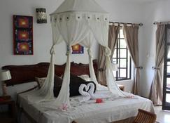 La Digue Self-Catering Apartments - La Digue - Sypialnia