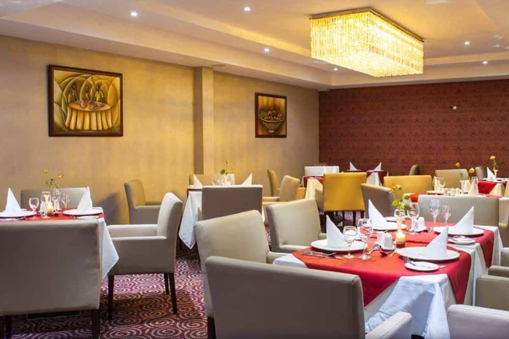 Grand Legacy Hotel - קיגאלי - מסעדה