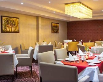 Grand Legacy Hotel - קיגאלי - מסעדה