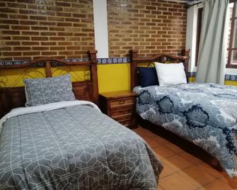 Hotel y Suites Axolotl - Chignahuapan - חדר שינה