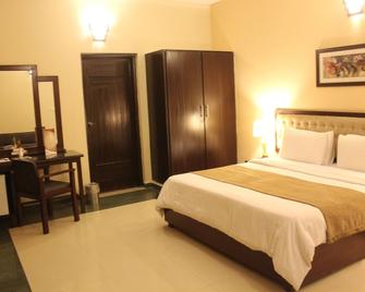 Hotel One Bahawalpur - Bahāwalpur - Habitación