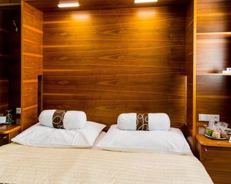 ديزاين هوتل نوم أرتش - برنو - غرفة نوم