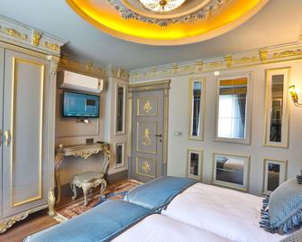 Real King Suite Hotel - טראבזון - חדר שינה