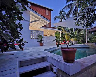 Amanda's Place Casita Carinosa - pool and tropical garden - Caye Caulker - Patio