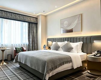 Shuiyi Carnival Hotel - Heze - Спальня