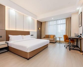 Golden Stone Business Hotel - Yancheng - Camera da letto